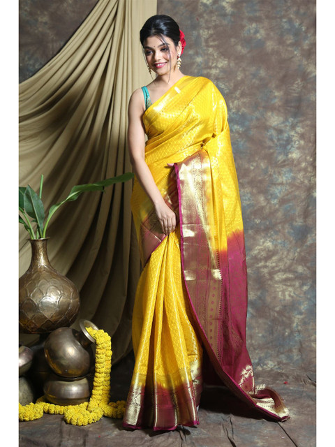 Charukriti Yellow & Purple Ethnic Motifs Zari Pure Silk Saree 
Charukriti Yellow & Purple Ethnic Motifs Zari Pure Silk Saree