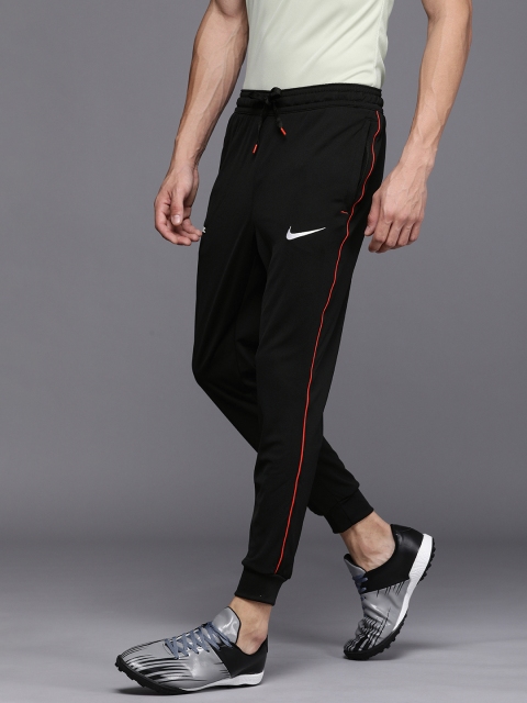 Nike Sportswear Men Black Brand Logo Printed Mid-Rise Regular Joggers With Side Stripes
Nike Sportswear Men Black Brand Logo Printed Mid-Rise Regular Joggers With Side Stripes