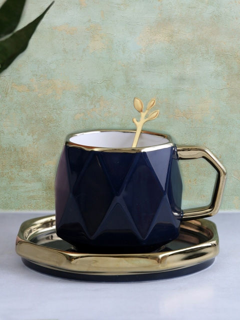 A Vintage Affair- Home Decor Navy Blue & Gold-Toned Textured Ceramic Cup & Saucer Set
A Vintage Affair- Home Decor Navy Blue & Gold-Toned Textured Ceramic Cup & Saucer Set