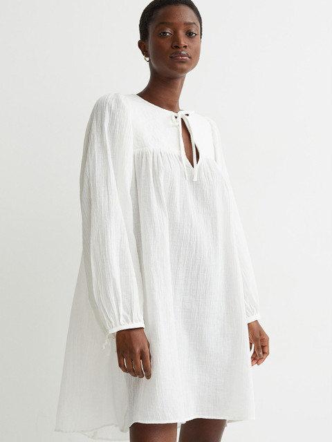 H&M Women White Solid Airy Cotton Dress 
H&M Women White Solid Airy Cotton Dress