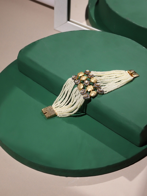 RITU SINGH Women Gold-Toned & White Sterling Silver Kundan Gold-Plated Bracelet
RITU SINGH Women Gold-Toned & White Sterling Silver Kundan Gold-Plated Bracelet