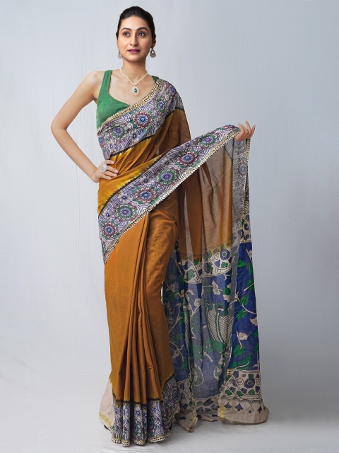 Unnati Silks Brown & Blue Kalamkari Handloom Sustainable Pure Cotton Kanjeevaram Saree
Unnati Silks Brown & Blue Kalamkari Handloom Sustainable Pure Cotton Kanjeevaram Saree
