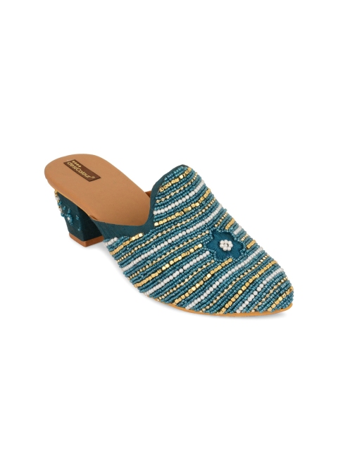 DESI COLOUR Women Teal Pearl Hand Enbroided regular ankle and open back Ethnic Block Mules
DESI COLOUR Women Teal Pearl Hand Enbroided regular ankle and open back Ethnic Block Mules