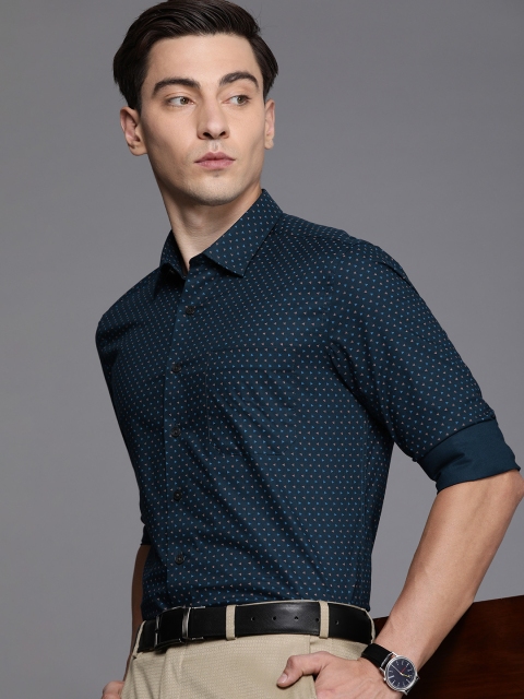 Louis Philippe Men Navy Blue & Pink Pure Cotton Geometric Printed Slim Fit Formal Shirt
Louis Philippe Men Navy Blue & Pink Pure Cotton Geometric Printed Slim Fit Formal Shirt