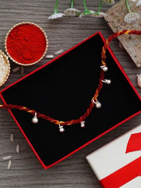 eCraftIndia Red Premium Ghungroo 925 Silver Rakhi on Moli Thread and Roli Chawal Pack
eCraftIndia Red Premium Ghungroo 925 Silver Rakhi on Moli Thread and Roli Chawal Pack