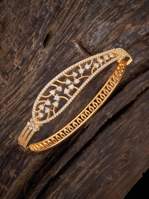 Kushal's Fashion Jewellery Women Gold-Toned & White Cubic Zirconia Gold-Plated Kada Bracelet
Kushal's Fashion Jewellery Women Gold-Toned & White Cubic Zirconia Gold-Plated Kada Bracelet