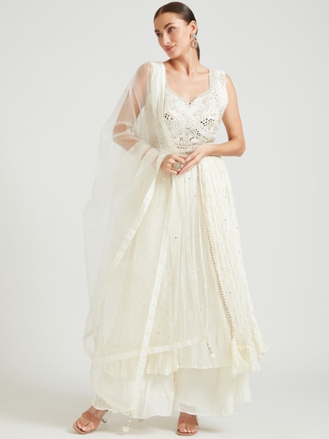 Neerus Women Cream-Coloured Striped Panelled Sequinned Kurta with Skirt & With Dupatta
Neerus Women Cream-Coloured Striped Panelled Sequinned Kurta with Skirt & With Dupatta