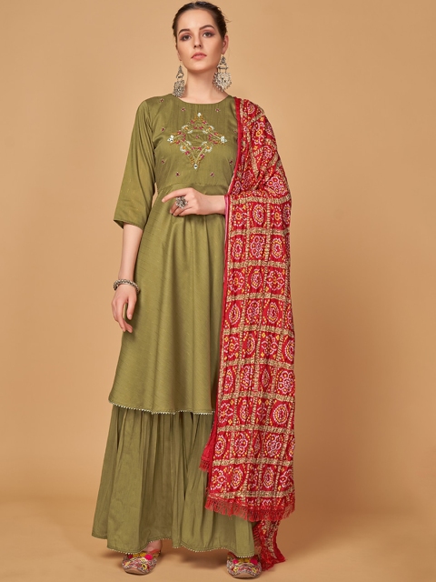 MONJOLIKA FASHION Women Olive Green Ethnic Motifs Yoke Design Kurta with Sharara & With Dupatta
MONJOLIKA FASHION Women Olive Green Ethnic Motifs Yoke Design Kurta with Sharara & With Dupatta