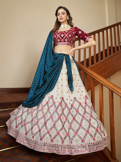 ODETTE Beige & Purple Embroidered Mirror Work Semi-Stitched Lehenga & Unstitched Blouse With Dupatta
ODETTE Beige & Purple Embroidered Mirror Work Semi-Stitched Lehenga & Unstitched Blouse With Dupatta