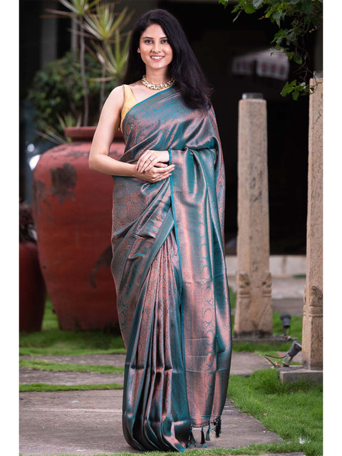 KARAGIRI Blue & Copper-Toned Woven Design Zari Kanjeevaram Saree 
KARAGIRI Blue & Copper-Toned Woven Design Zari Kanjeevaram Saree
