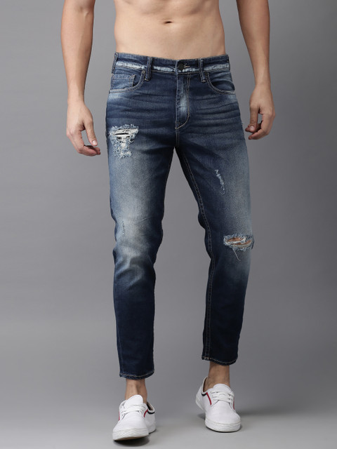 HERE&NOW Men Navy Blue Slim Fit Mid-Rise Ankle Length Highly Distressed Stretchable Jeans
HERE&NOW Men Navy Blue Slim Fit Mid-Rise Ankle Length Highly Distressed Stretchable Jeans
