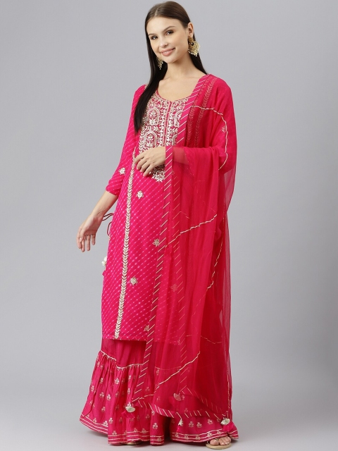 Divena Women Pink Leheriya Embroidered Zardozi Silk Georgette Kurta with Sharara & With Dupatta
Divena Women Pink Leheriya Embroidered Zardozi Silk Georgette Kurta with Sharara & With Dupatta