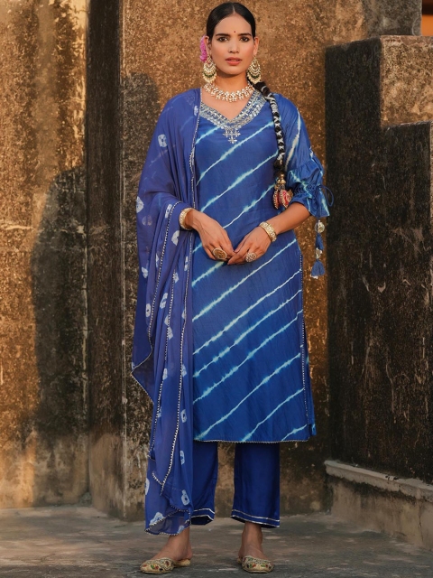 SCAKHI Women Blue Leheriya Dyed Mirror Work Chanderi Cotton Kurta with Trousers & Dupatta
SCAKHI Women Blue Leheriya Dyed Mirror Work Chanderi Cotton Kurta with Trousers & Dupatta