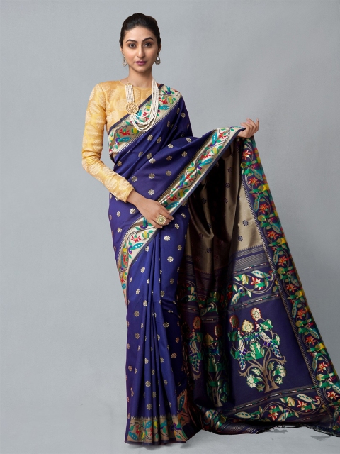 Unnati Silks Women Navy Blue & Gold-Toned Floral Zari Silk Blend Banarasi Saree
Unnati Silks Women Navy Blue & Gold-Toned Floral Zari Silk Blend Banarasi Saree