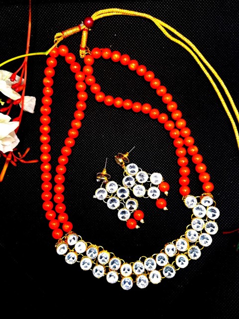 Kshitij Jewels Gold-Plated White & Orange Stone-Studded & Pearl Beaded Jewellery Set
Kshitij Jewels Gold-Plated White & Orange Stone-Studded & Pearl Beaded Jewellery Set