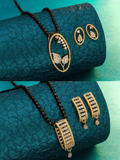 aadita Set Of 2 Gold-Plated White & Black Stone-Studded & Beaded Mangalsutra With Earrings
aadita Set Of 2 Gold-Plated White & Black Stone-Studded & Beaded Mangalsutra With Earrings