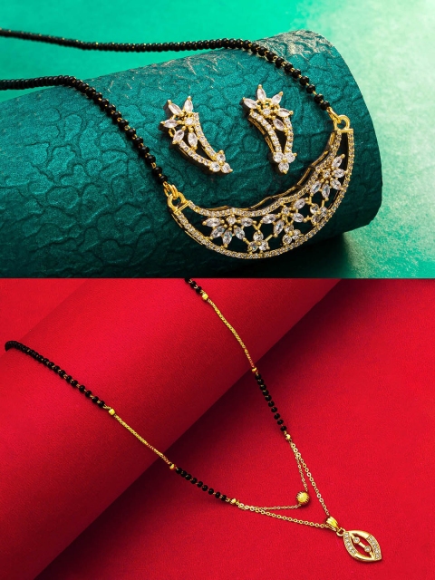 aadita Set Of 2 Gold-Plated White Stone-Studded & Black-Beaded Mangalsutra With Earrings
aadita Set Of 2 Gold-Plated White Stone-Studded & Black-Beaded Mangalsutra With Earrings