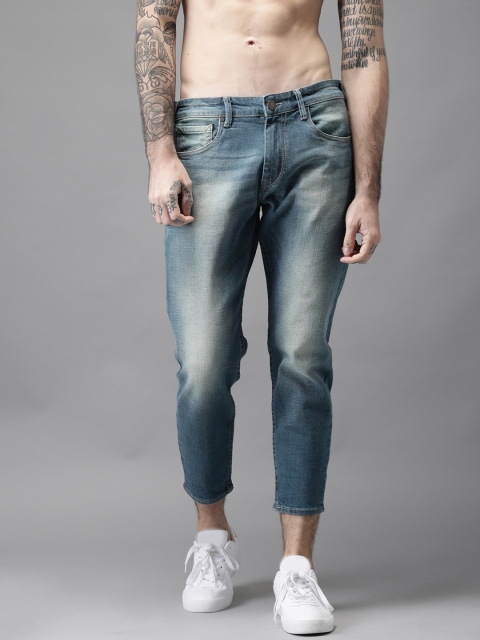 Moda Rapido Men Blue Slim Tapered Fit Cropped Mid-Rise Clean Look Stretchable Jeans
Moda Rapido Men Blue Slim Tapered Fit Cropped Mid-Rise Clean Look Stretchable Jeans