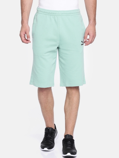 Puma Men Sea Green Solid Regular Fit Archive Logo Bermuda Aquifer Sports Shorts
Puma Men Sea Green Solid Regular Fit Archive Logo Bermuda Aquifer Sports Shorts