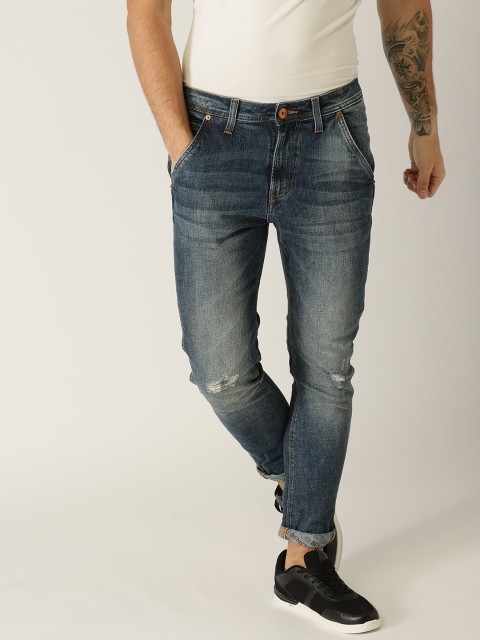 United Colors of Benetton Men Blue Carrot Fit Mid-Rise Low Distress Stretchable Jeans
United Colors of Benetton Men Blue Carrot Fit Mid-Rise Low Distress Stretchable Jeans