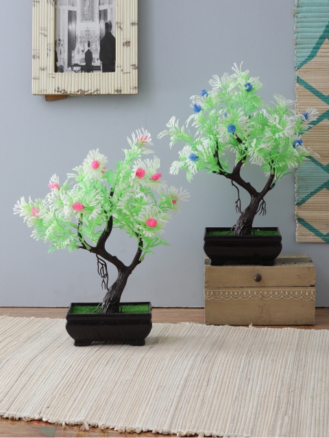 Foliyaj S Shaped Bonsai Tree With Green Leaves and Small Purple Flowers in Brown Pot, Blue
Foliyaj S Shaped Bonsai Tree With Green Leaves and Small Purple Flowers in Brown Pot, Blue