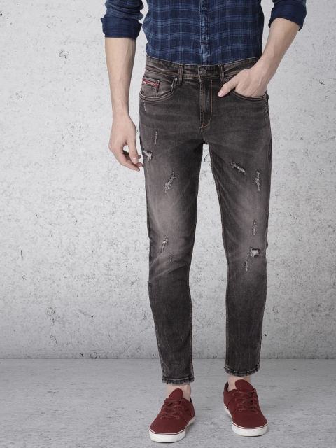 Ecko Unltd Men Charcoal Grey Tapered Fit Mid-Rise Mildly Distressed Stretchable Jeans
Ecko Unltd Men Charcoal Grey Tapered Fit Mid-Rise Mildly Distressed Stretchable Jeans
