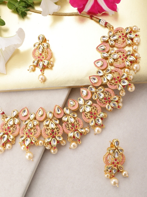 Melani Borsa Peach-Coloured Gold-Plated Kundan-Studded Enamelled Handcrafted Jewellery Set
Melani Borsa Peach-Coloured Gold-Plated Kundan-Studded Enamelled Handcrafted Jewellery Set
