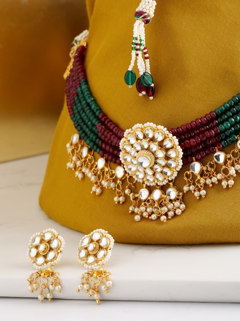 Melani Borsa Green & Red Gold-Plated Kundan-Studded & Beaded Handcrafted Jewellery Set
Melani Borsa Green & Red Gold-Plated Kundan-Studded & Beaded Handcrafted Jewellery Set