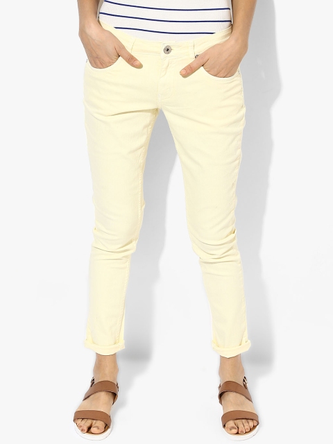 People Women Yellow Solid Mid Rise Slim Fit Stretchable Jeans