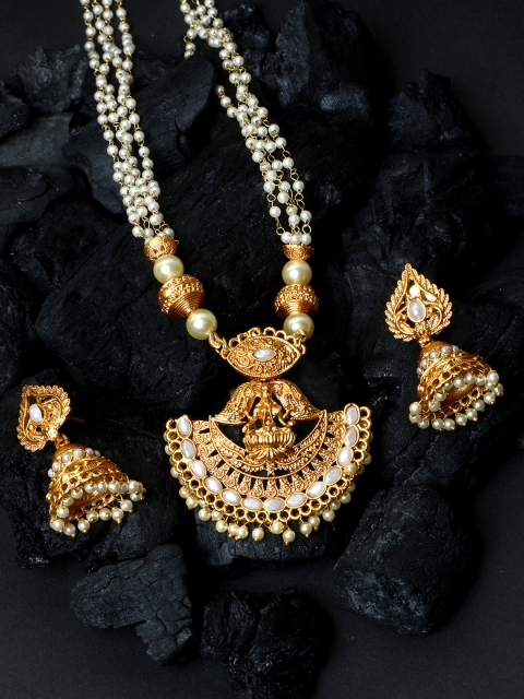 ANIKAS CREATION Women Gold-Plated Goddess Laxmi White Stone-Studded Temple Jewellery Set
ANIKAS CREATION Women Gold-Plated Goddess Laxmi White Stone-Studded Temple Jewellery Set