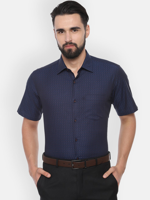 Van Heusen Men Navy Blue Regular Fit Checked Formal Shirt
Van Heusen Men Navy Blue Regular Fit Checked Formal Shirt
