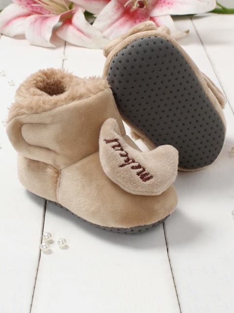 Walktrendy Kids Beige Solid Booties with Applique Detail