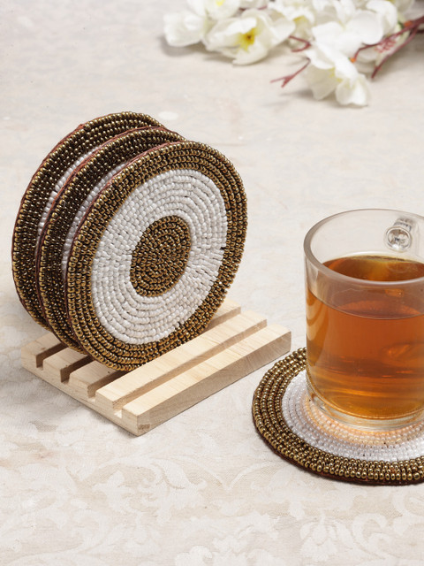 Alina Decor Set of 4 Beads Work Coasters With Wooden Stand, Off white 
Alina Decor Set of 4 Beads Work Coasters With Wooden Stand, Off white