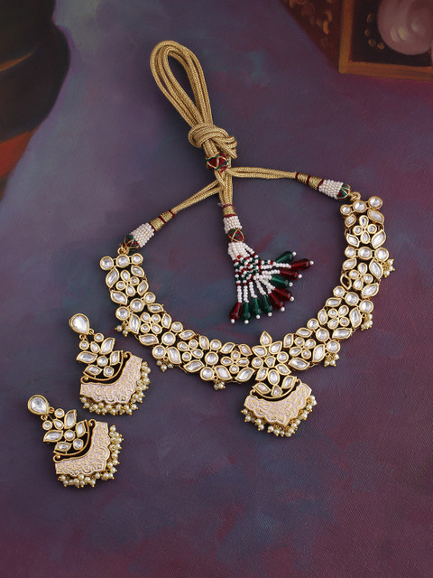 Studio Voylla Women Brass-Plated Gold-Toned & White Enamelled Udaipur Jewellery Set
Studio Voylla Women Brass-Plated Gold-Toned & White Enamelled Udaipur Jewellery Set