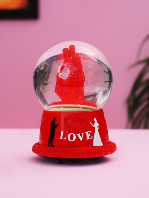 Archies Unisex Red and White Polyresin Love Couple in Glitter Snowglobe Showpiece
Archies Unisex Red and White Polyresin Love Couple in Glitter Snowglobe Showpiece