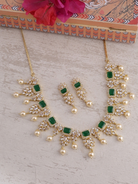 Voylla Women Gold-Plated & White Handcrafted Emerald Cut CZ Gems Adorned Jewellery Set
Voylla Women Gold-Plated & White Handcrafted Emerald Cut CZ Gems Adorned Jewellery Set