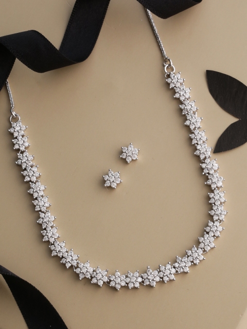 Tistabene Silver-Toned & White Stone-Studded Floral Design Rhodium Plated Jewellery Set
Tistabene Silver-Toned & White Stone-Studded Floral Design Rhodium Plated Jewellery Set