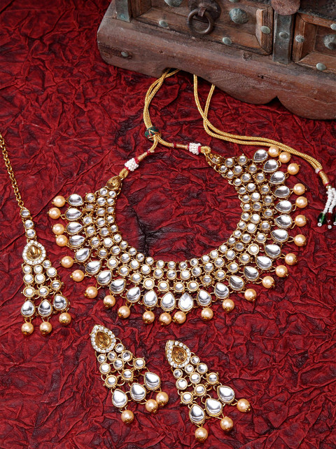 Shining Diva Gold-Plated White & Beige Kundan Studded Pearl Embellished Antique Jewellery Set
Shining Diva Gold-Plated White & Beige Kundan Studded Pearl Embellished Antique Jewellery Set