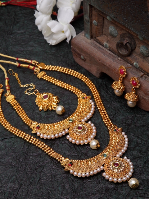 Shining Diva Gold-Plated Off-White & Red Stone Studded Pearl Embellished Antique Jewellery Set
Shining Diva Gold-Plated Off-White & Red Stone Studded Pearl Embellished Antique Jewellery Set