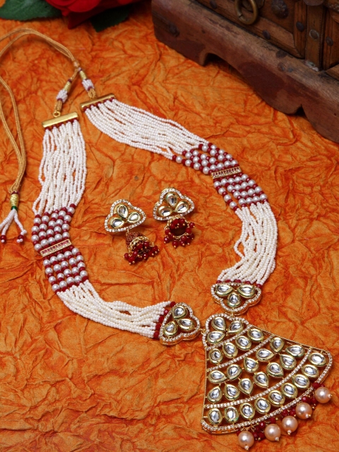 Moedbuille Gold-Plated White & Red Kundan-Studded Onyx Beaded Meenakari Jadau Jewellery Set
Moedbuille Gold-Plated White & Red Kundan-Studded Onyx Beaded Meenakari Jadau Jewellery Set