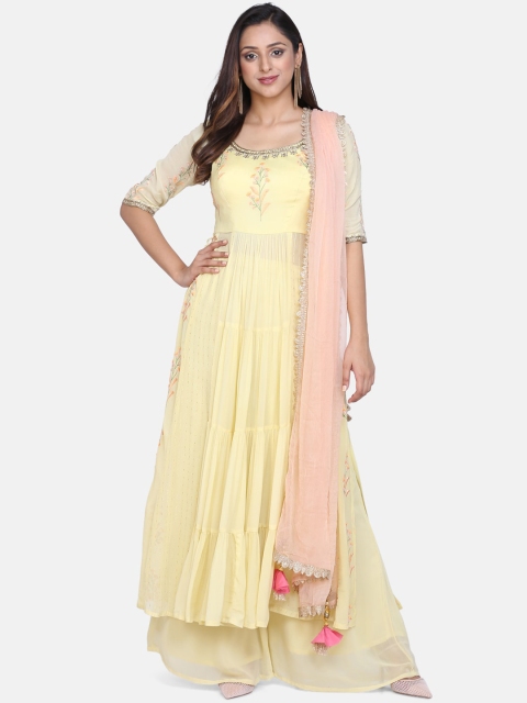 BOMBAY SELECTIONS Women Yellow & Peach-Coloured Solid Kurta with Palazzos & Dupatta
BOMBAY SELECTIONS Women Yellow & Peach-Coloured Solid Kurta with Palazzos & Dupatta