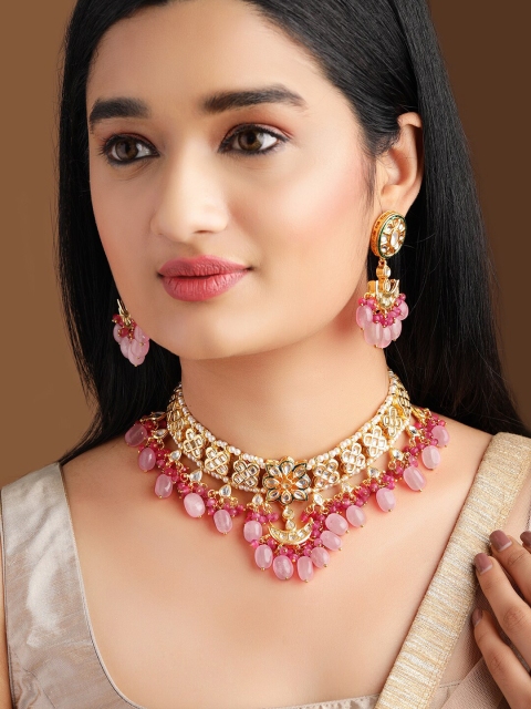 Rubans Gold-Plated Pink & White Kundan-Studded Gemstone Beaded Handcrafted Jewellery Set
Rubans Gold-Plated Pink & White Kundan-Studded Gemstone Beaded Handcrafted Jewellery Set