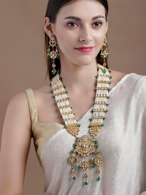 rubans LUXURY 22K Gold-Plated White & Green Emerald-Studded Handcrafted Jewellery Set
rubans LUXURY 22K Gold-Plated White & Green Emerald-Studded Handcrafted Jewellery Set