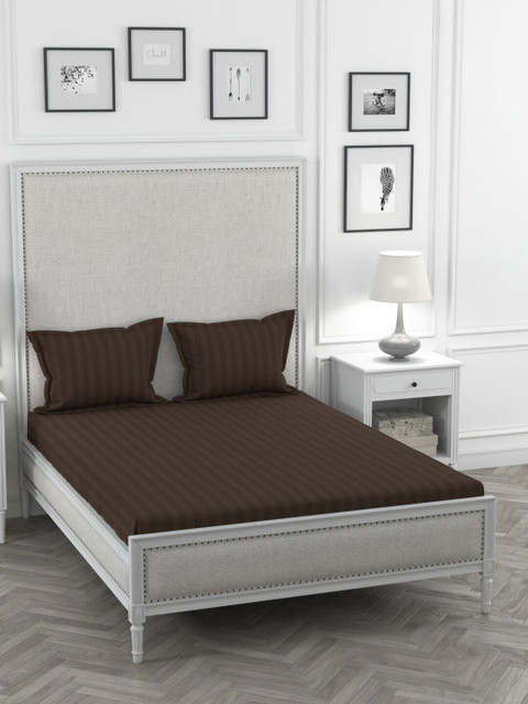 Portico New York Brown Solid TC Cotton 1 Super King Bedsheet with 2 Pillow Covers
Portico New York Brown Solid TC Cotton 1 Super King Bedsheet with 2 Pillow Covers