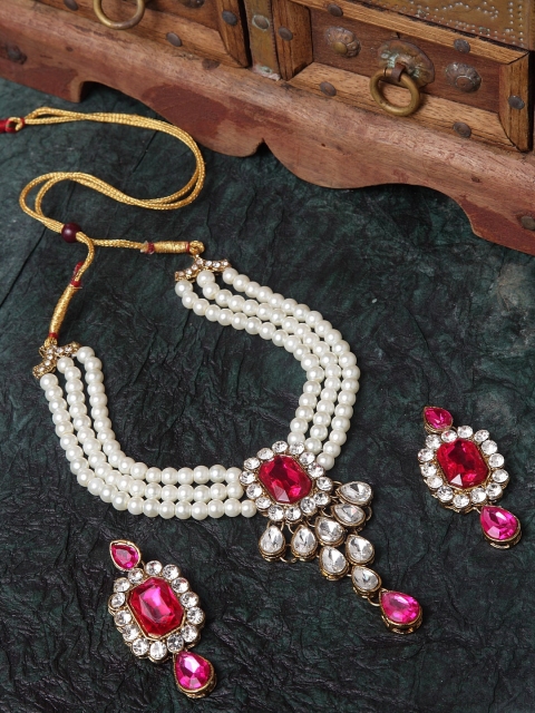 Shining Diva Gold-Plated White & Pink Kundan & Artificial Stone Studded Pearl Beaded Antique Jewellery Set
Shining Diva Gold-Plated White & Pink Kundan & Artificial Stone Studded Pearl Beaded Antique Jewellery Set
