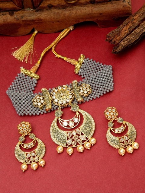 Melani Borsa Gold-Plated & Grey American Diamond Studded Handcrafted Choker Jewellery Set
Melani Borsa Gold-Plated & Grey American Diamond Studded Handcrafted Choker Jewellery Set