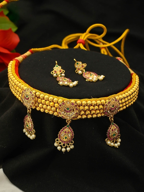 Imittire Gold-Plated & Pink Stone Studded Traditional Rajputi Handcrafted Choker Jewellery Set
Imittire Gold-Plated & Pink Stone Studded Traditional Rajputi Handcrafted Choker Jewellery Set