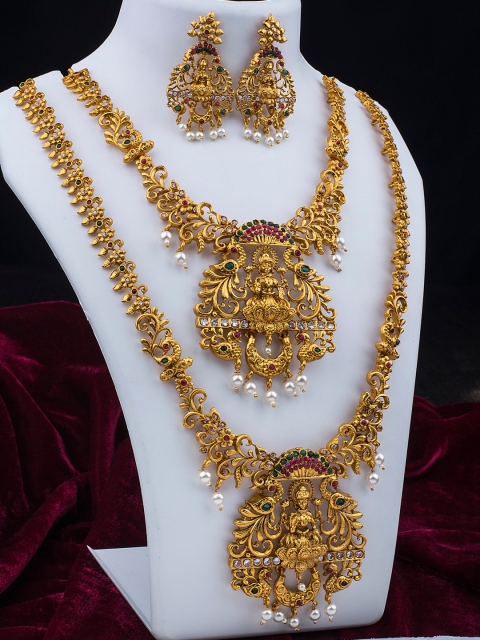 Alankruthi Gold-Plated Pink & Green Stone-Studded Textured Goddess Laxmi Temple Jewellery Set
Alankruthi Gold-Plated Pink & Green Stone-Studded Textured Goddess Laxmi Temple Jewellery Set