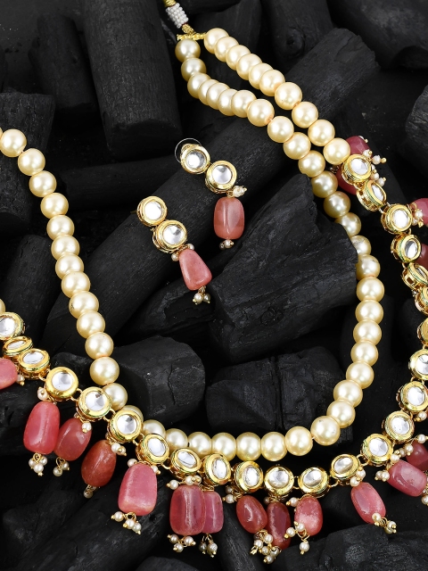 Silvermerc Designs German Silver Gold-Plated Pink & Off-White Kundan-Studded Beaded Jadau Handcrafted Jewellery Set
Silvermerc Designs German Silver Gold-Plated Pink & Off-White Kundan-Studded Beaded Jadau Handcrafted Jewellery Set