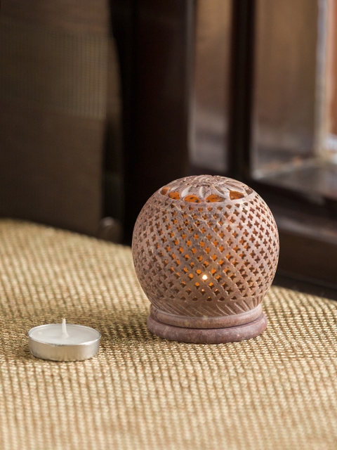 ExclusiveLane Brown The Shimmery Mughal Jali Hand Carved Table Tea-Light Candle Holder
ExclusiveLane Brown The Shimmery Mughal Jali Hand Carved Table Tea-Light Candle Holder